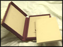 Clamshell box with envelope